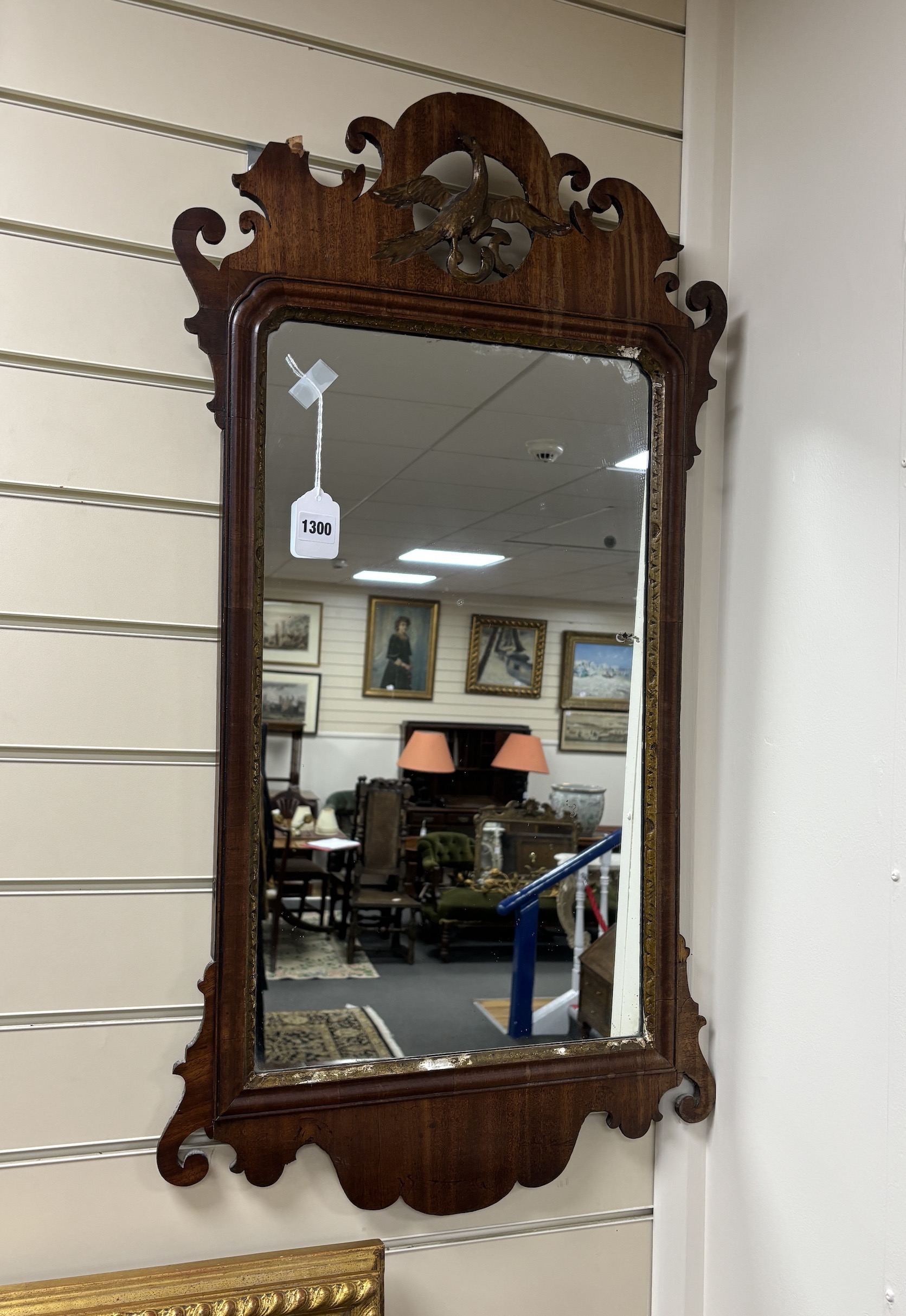 A George III mahogany fret-frame wall mirror, width 93cm, height 49cm